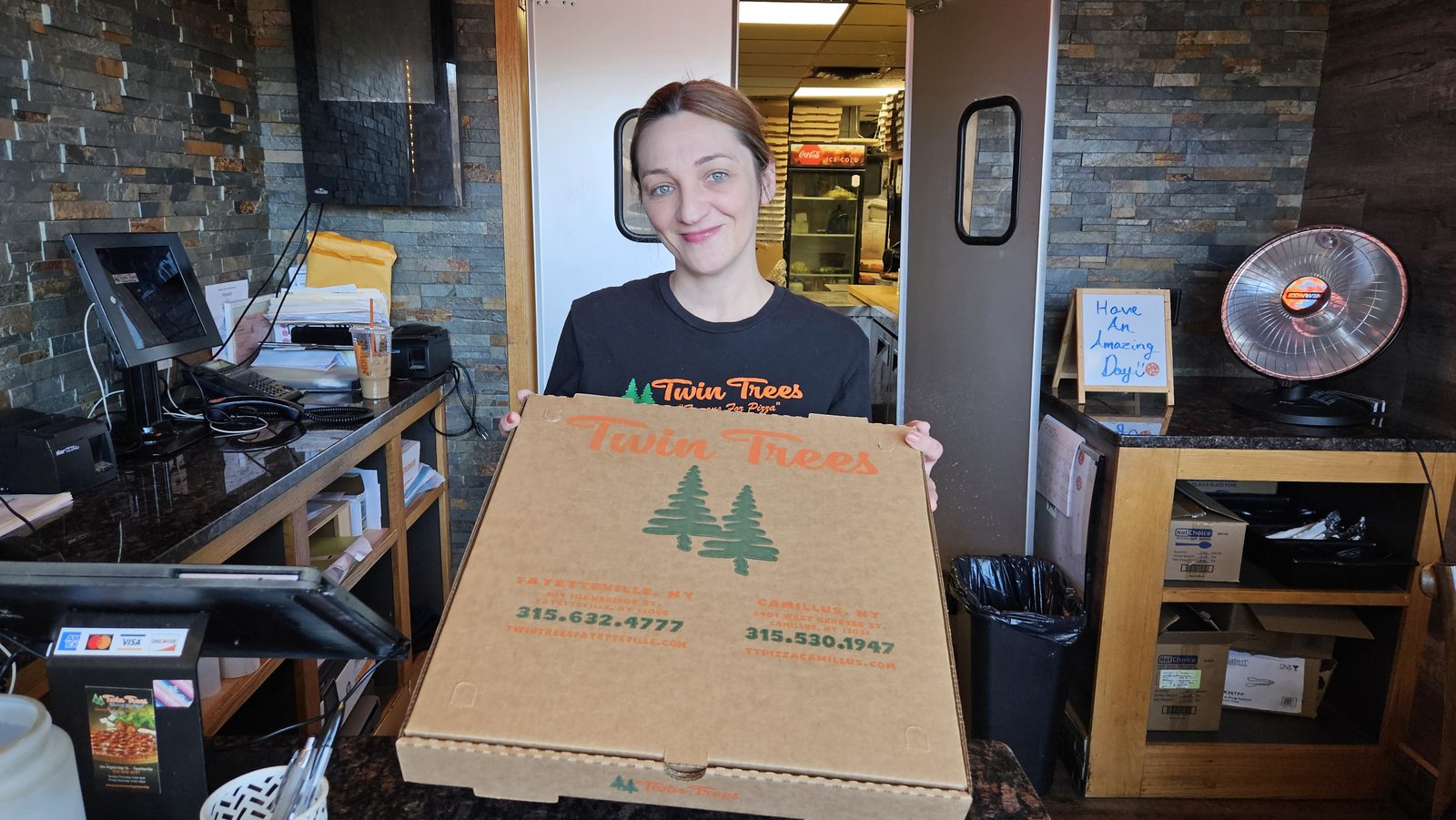 Twin Trees pizza box at the counter