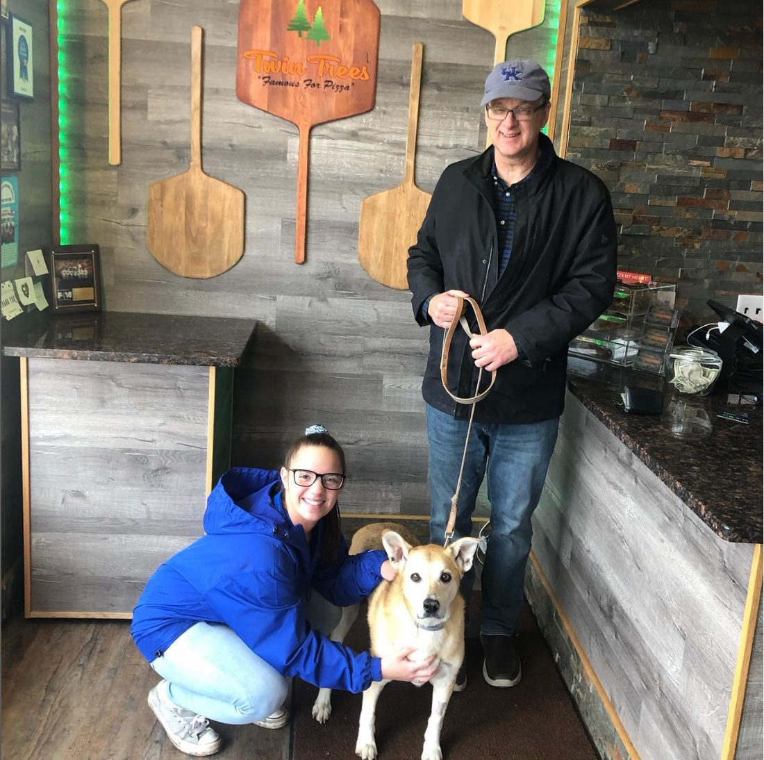A furry friend visiting the shop